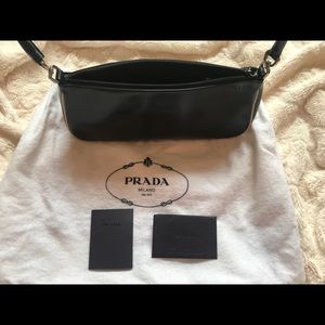 PRADA black leather handbag with white piping
